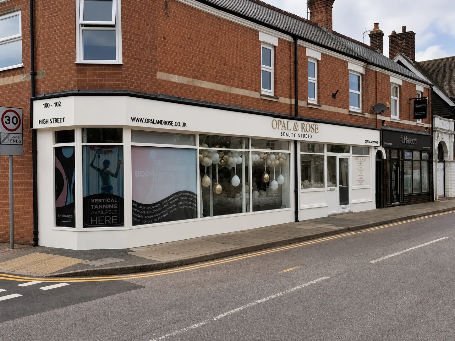 Completed Opal and Rose Beauty Studio fascia and window graphics on a corner shopfront