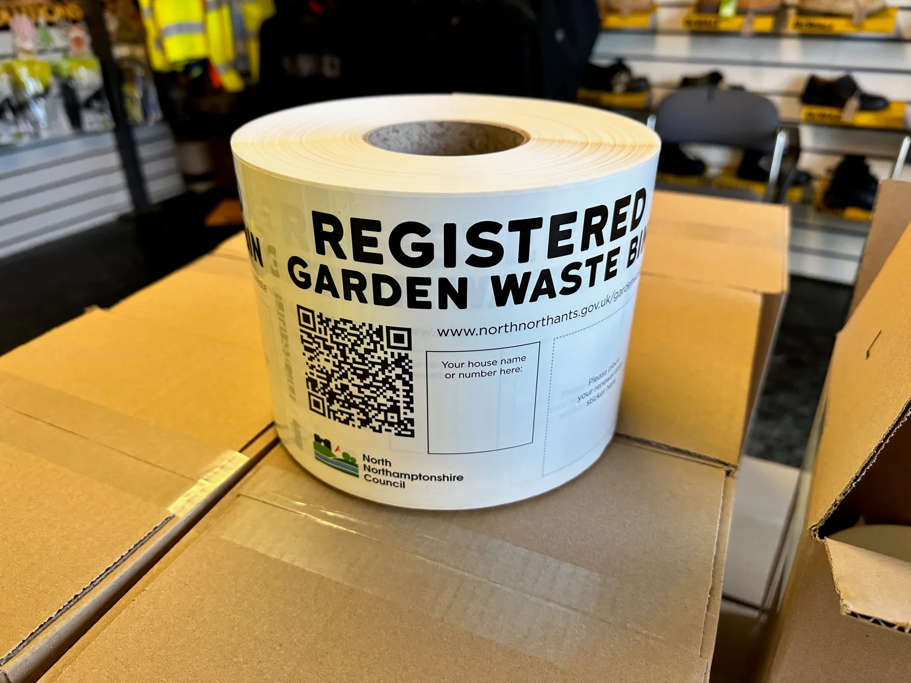 Large roll of printed North Northamptonshire Council garden waste registration labels