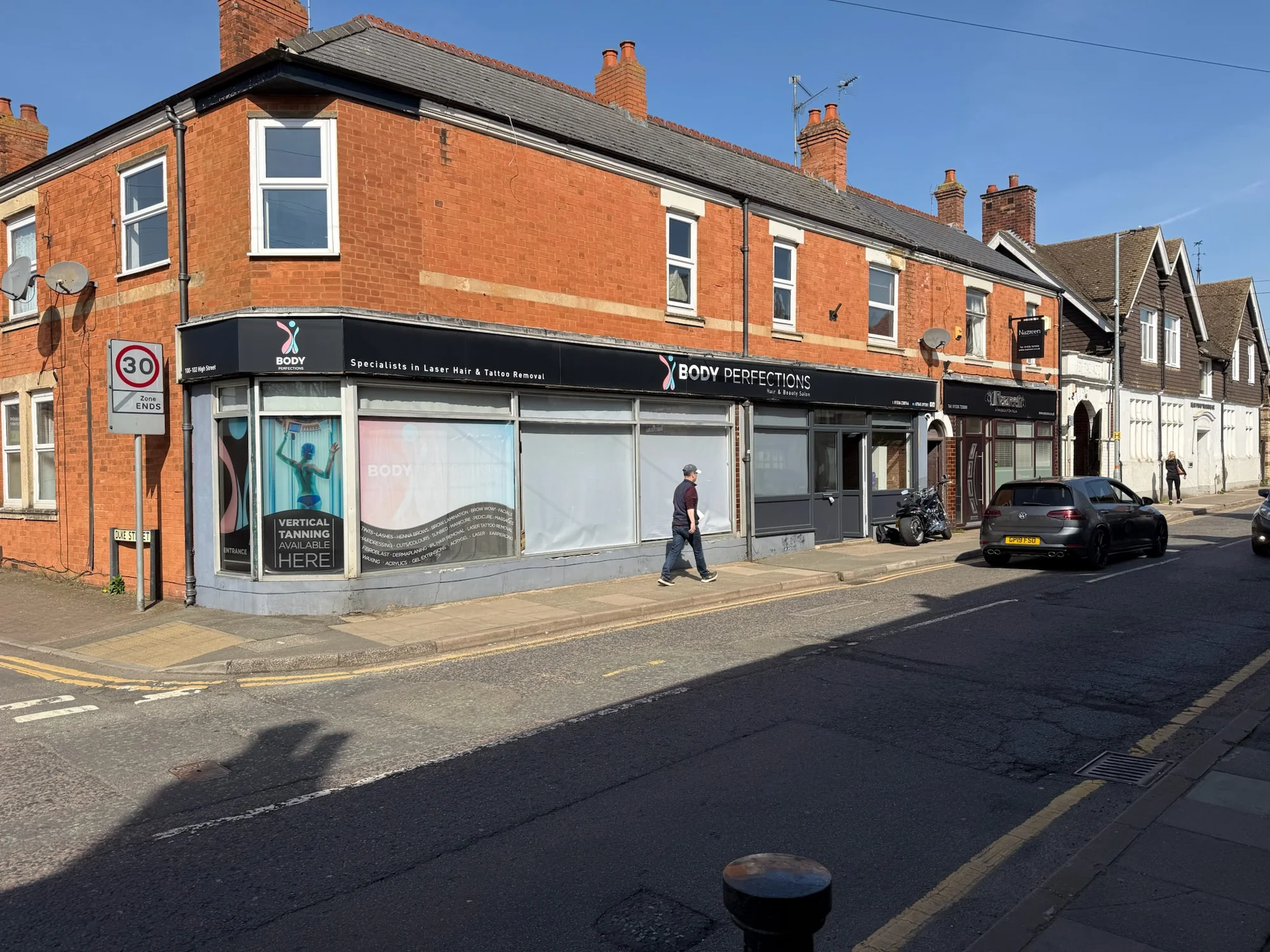 Corner shopfront before the Opal and Rose rebrand, carrying the former Body Perfections fascia