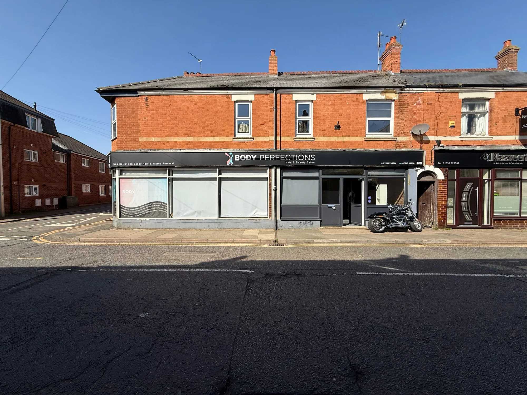 Front view of the shop before the Opal and Rose signage project